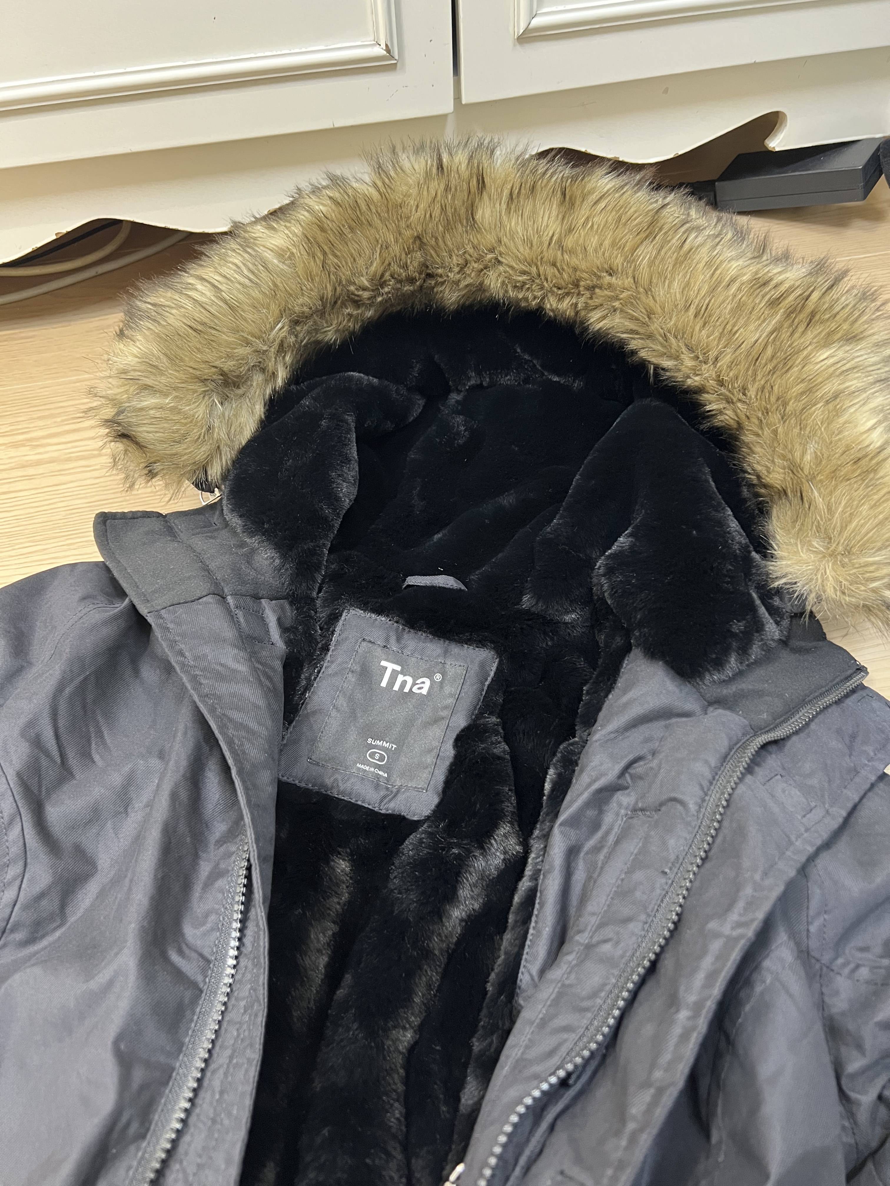 Aritzia's TNA long Parker down jacket thick and warmth