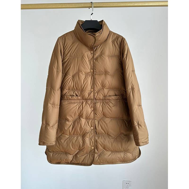 Down jacket female 2023 newly wears a high -length mid -length light and thin goose puffed