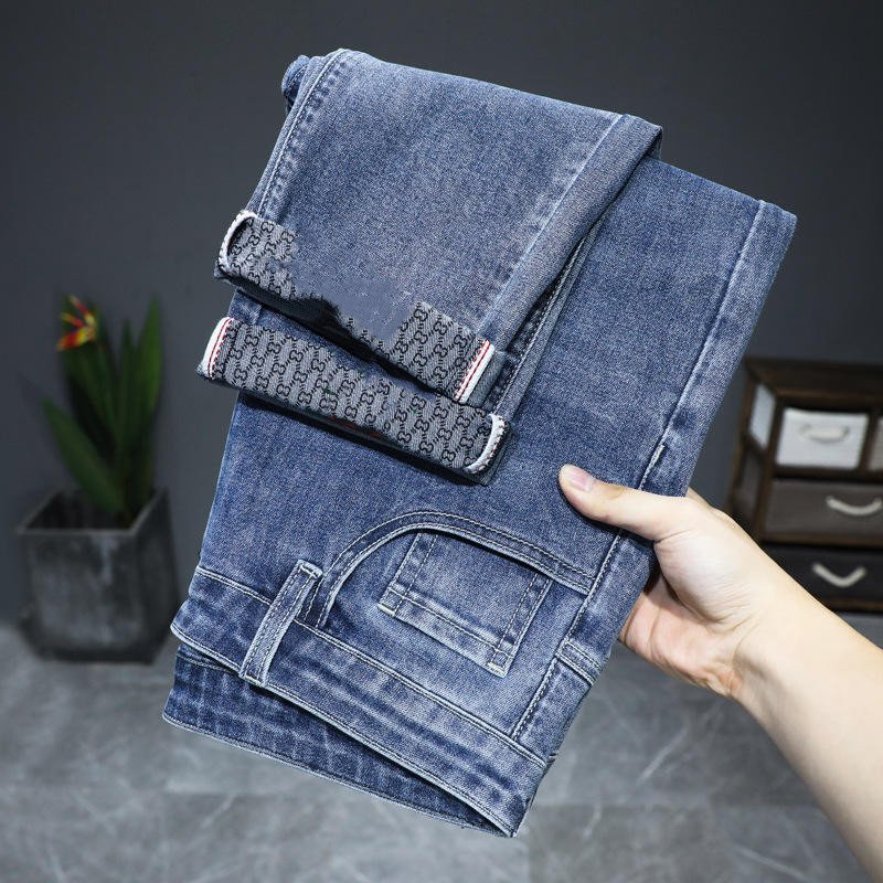 Autumn and winter new elastic business slim casual trend blue men and women jeans stock