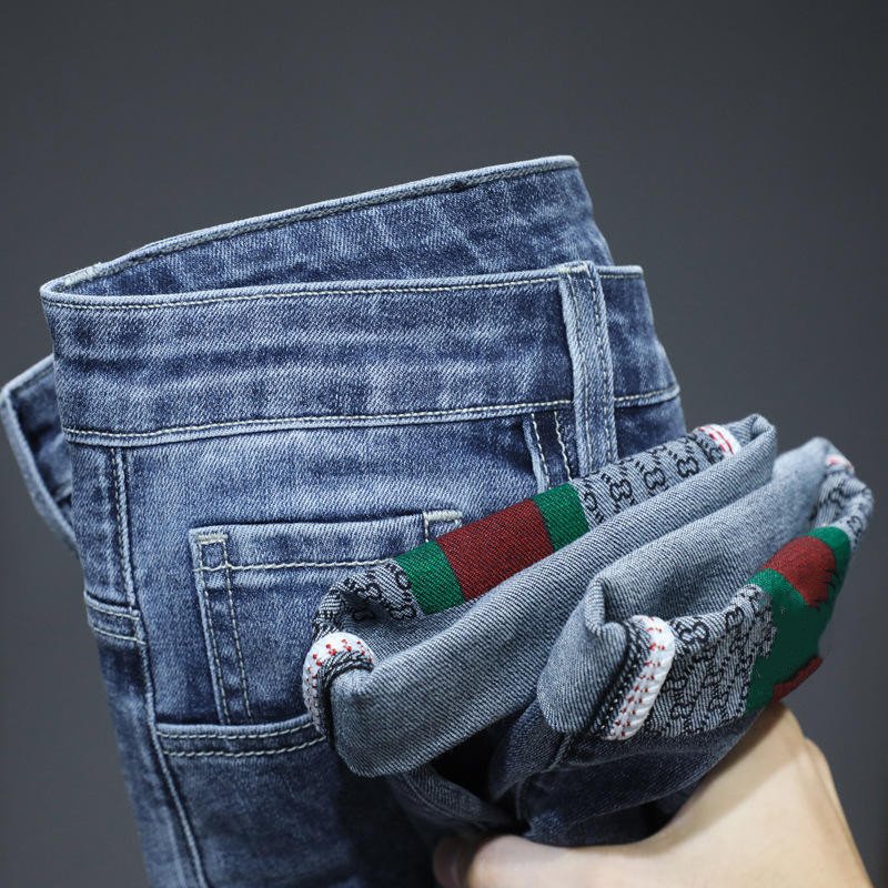Autumn and winter new elastic business slim casual trend blue men and women jeans stock