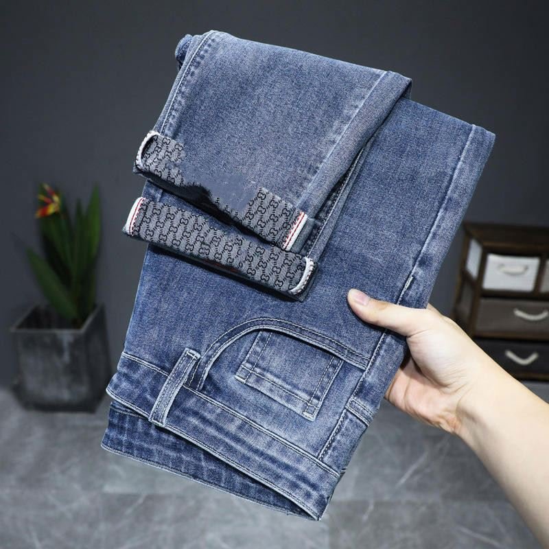 Autumn and winter new elastic business slim casual trend blue men and women jeans stock