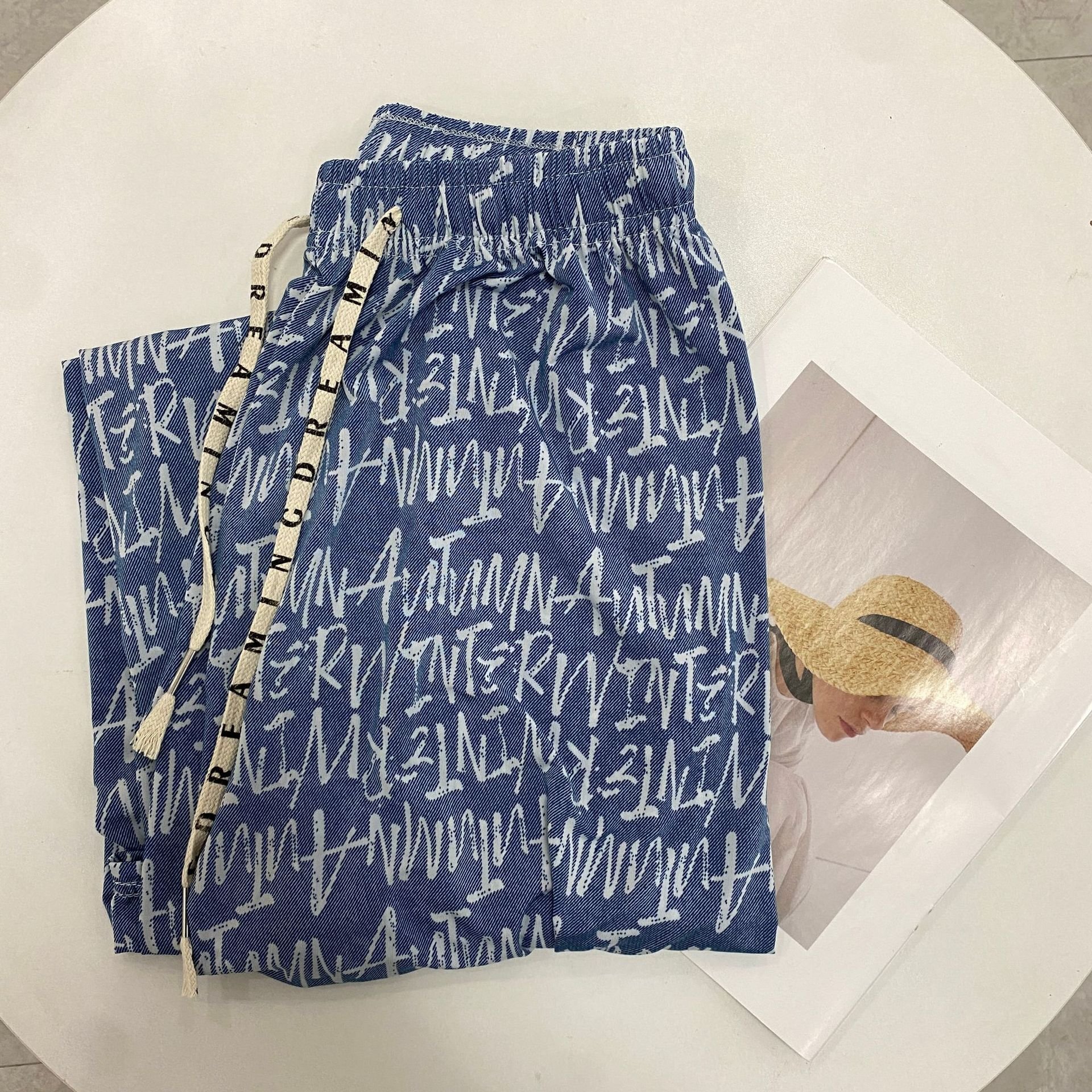 Low price High quality women's high waisted loose casual pants ice silk printed wide leg pants wholesale
