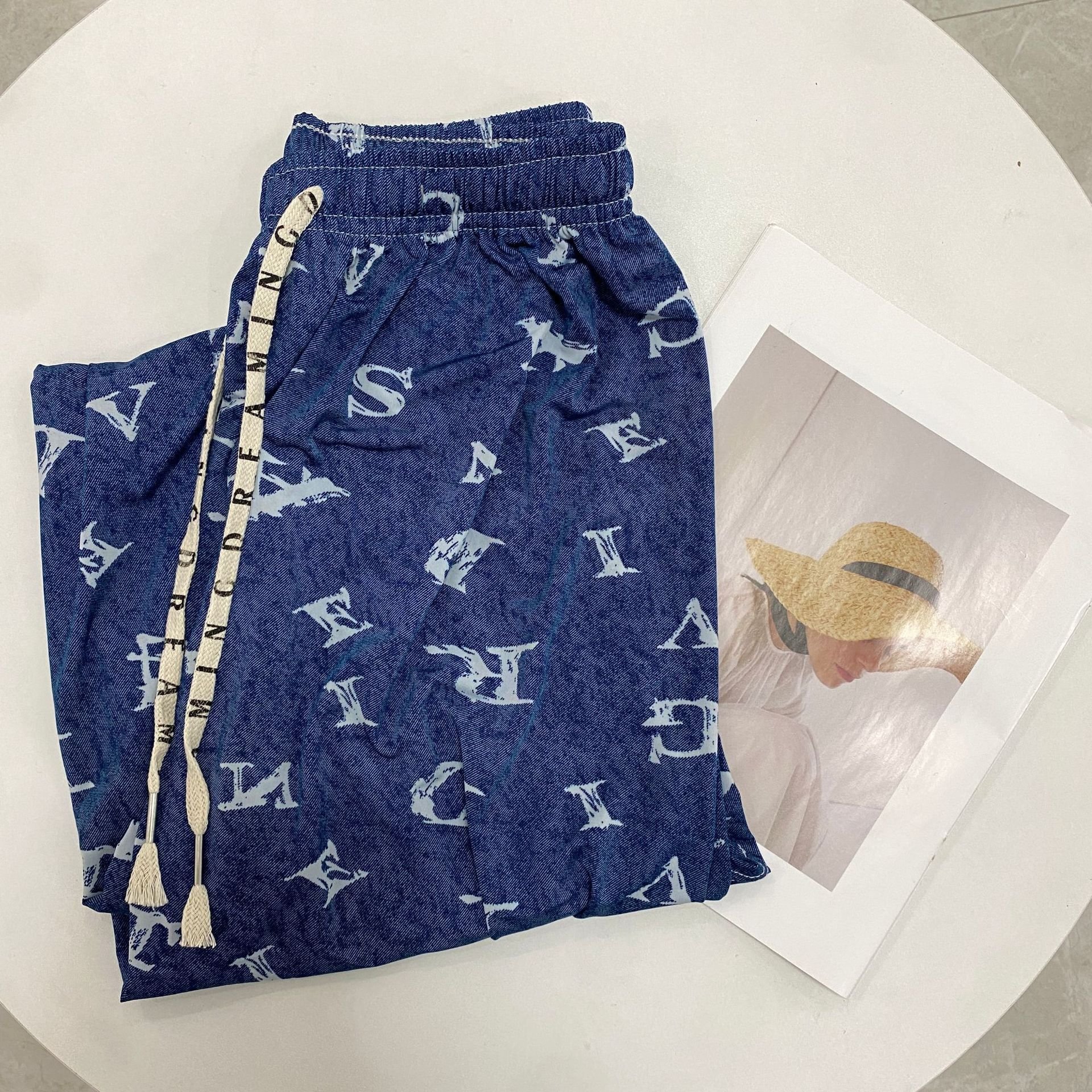 Low price High quality women's high waisted loose casual pants ice silk printed wide leg pants wholesale