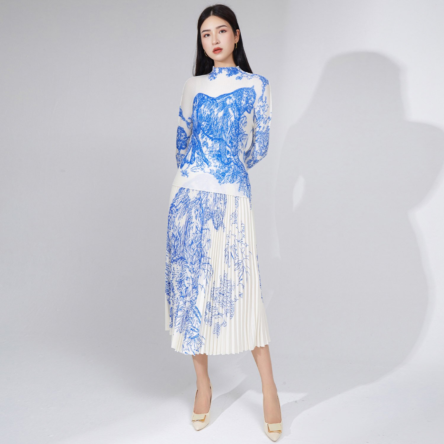 Best-Selling Women's Fashion Set: 2023 Stylish Pleated Elastic Stretch Top and Midi Skirt 2-Piece Set