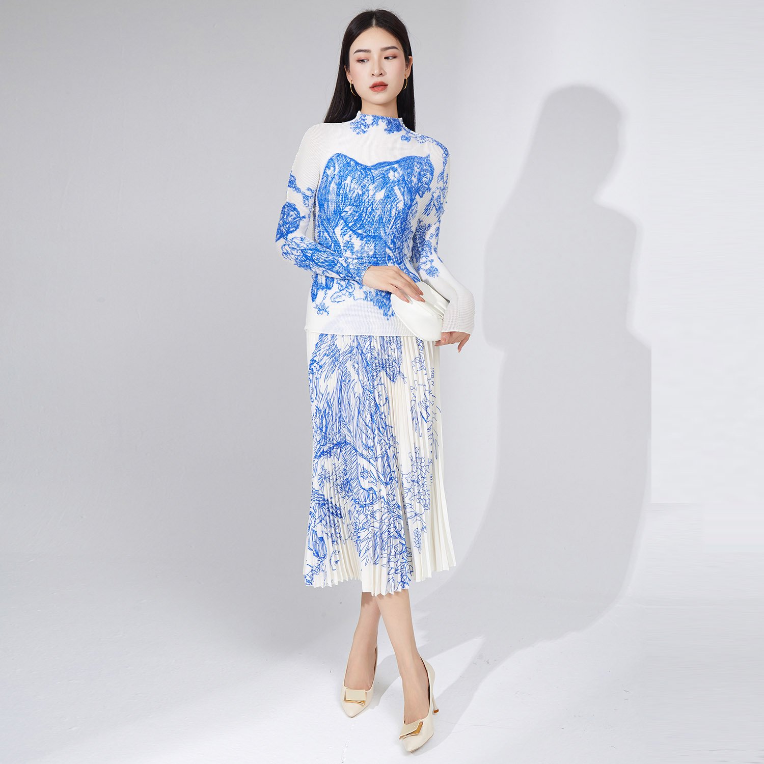 Best-Selling Women's Fashion Set: 2023 Stylish Pleated Elastic Stretch Top and Midi Skirt 2-Piece Set