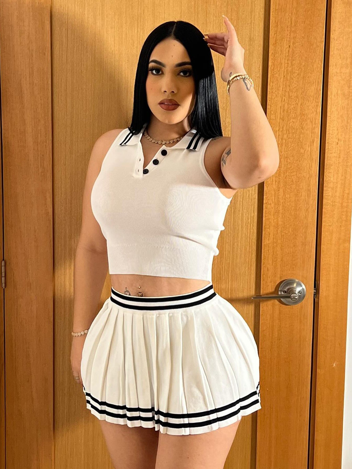 Peeqi HR24038 wholesale 2024 women 2 pieces knitted set striped sleeveless tank tops pleated skirt suit two piece set for women