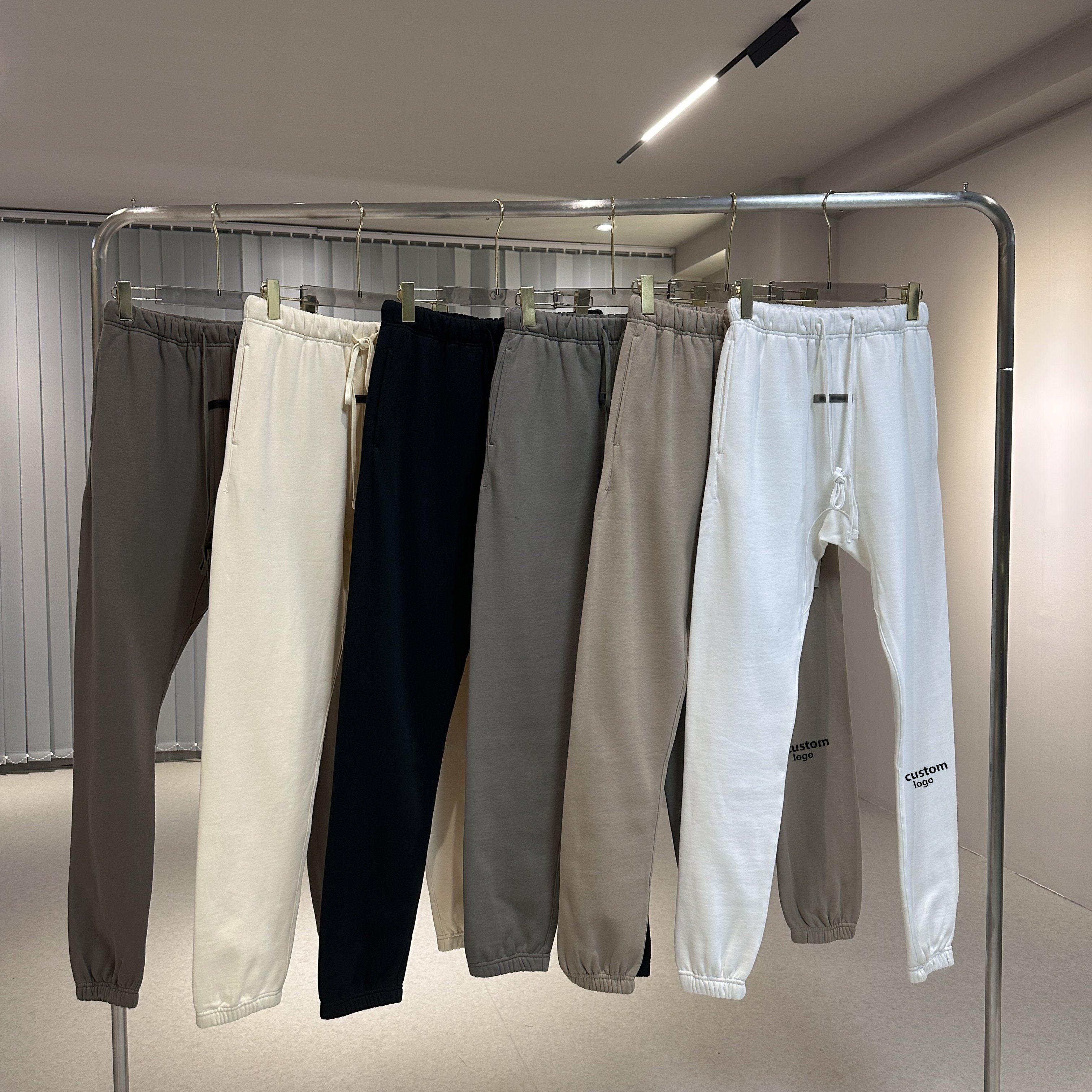 Manufacturer High Quality Custom LOGO 100% Cotton Fabric Ess Printing Hoodies Men's Athleisure Pants Joggers Sports Pants