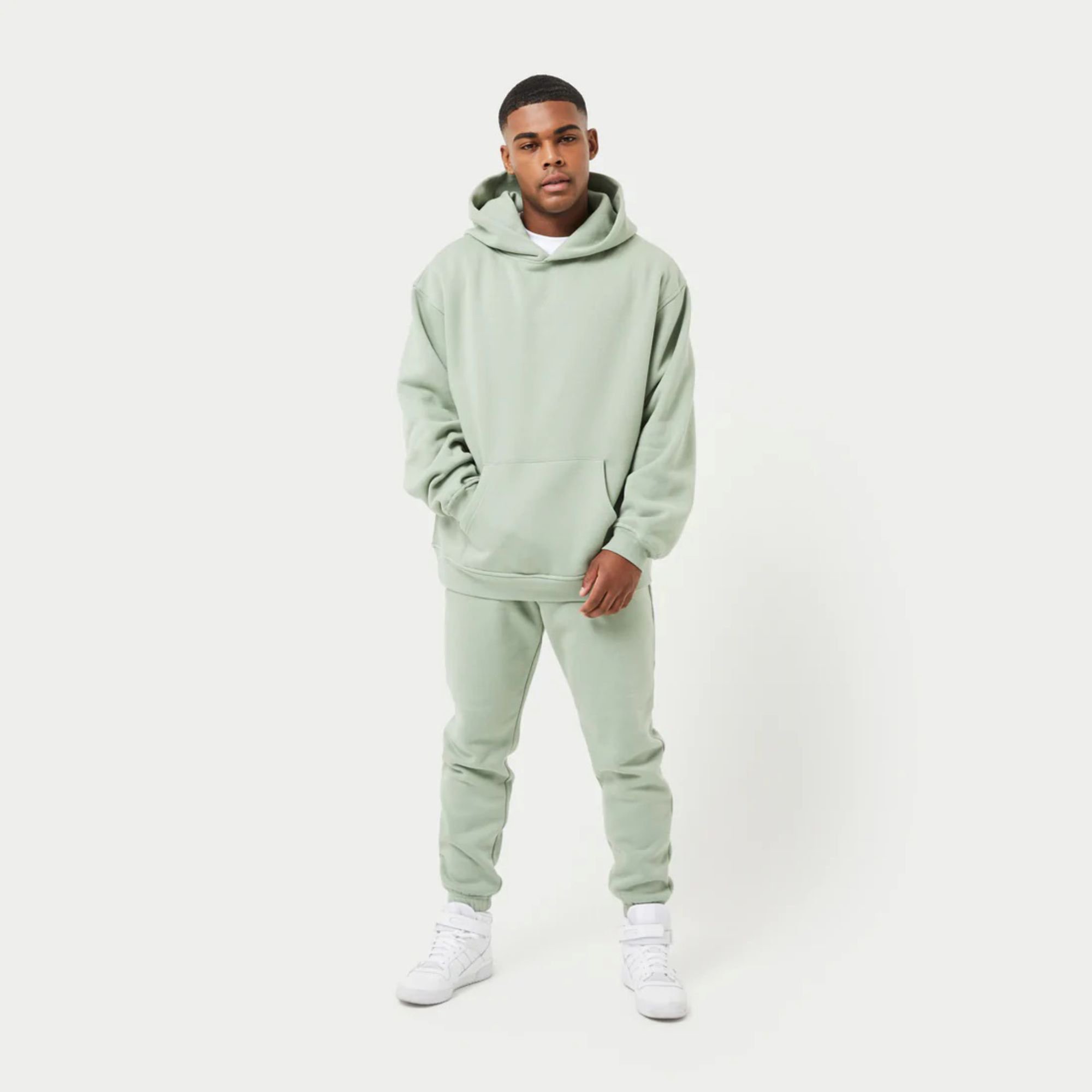 Top 80% Cotton 20% Polyester Drop shoulders Pullover style Cross over neckline Ribbed hem and cuffs Dust Green Oversized Hoodies