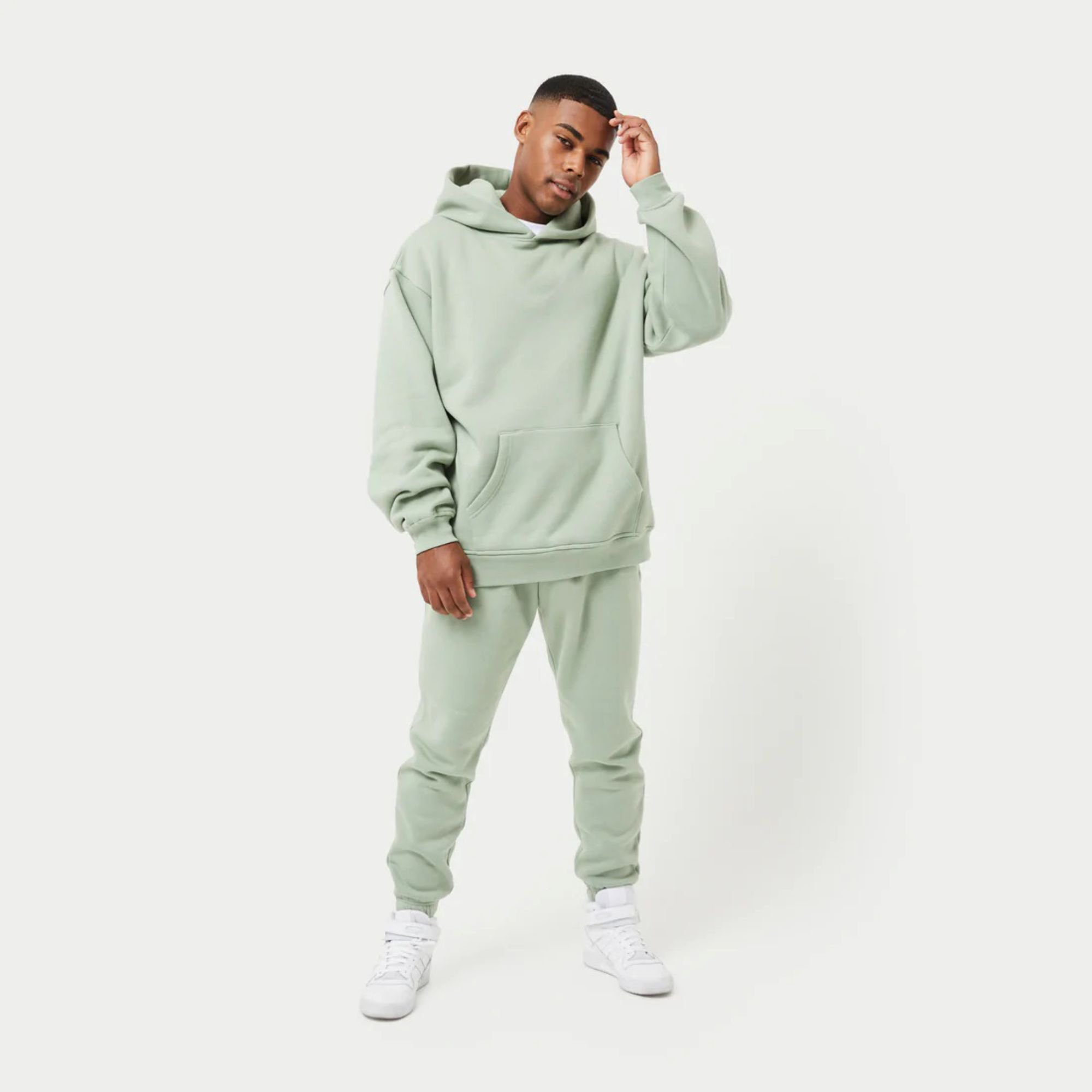 Top 80% Cotton 20% Polyester Drop shoulders Pullover style Cross over neckline Ribbed hem and cuffs Dust Green Oversized Hoodies