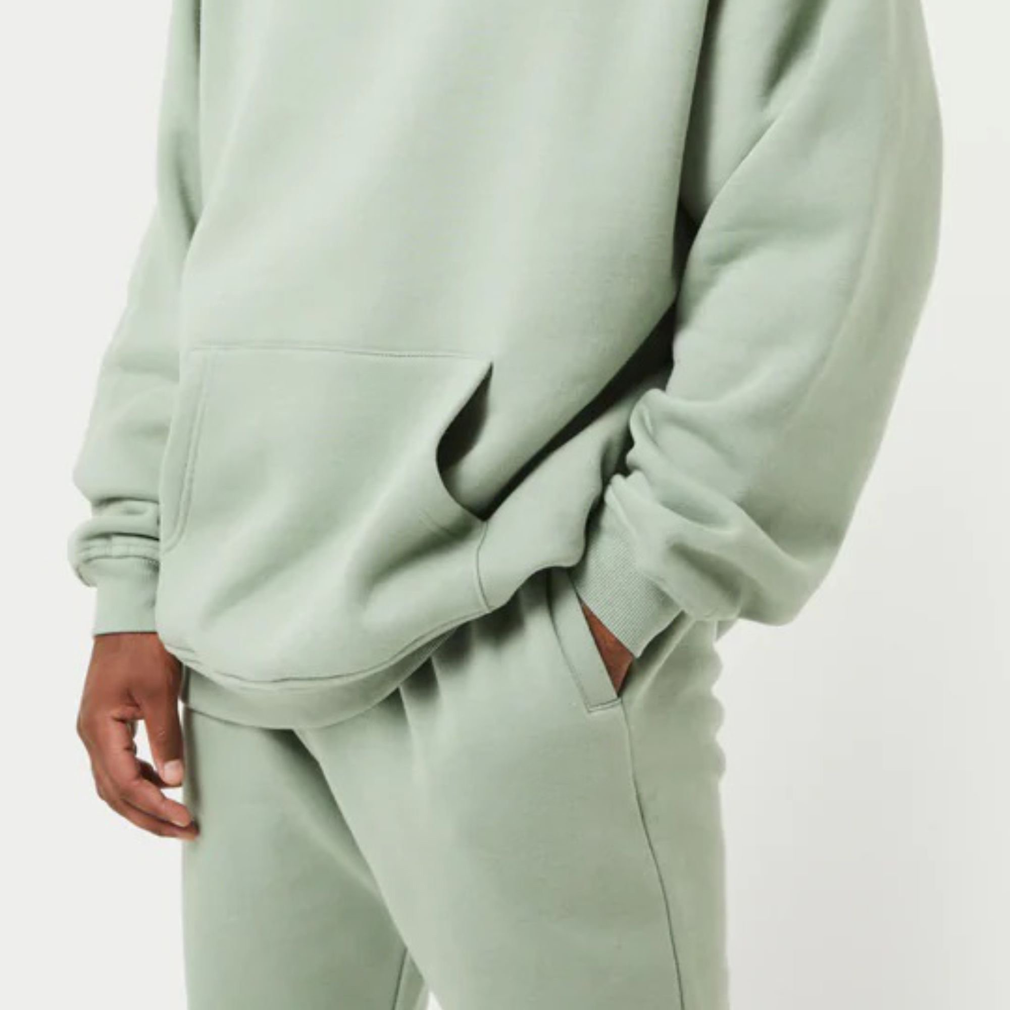 Top 80% Cotton 20% Polyester Drop shoulders Pullover style Cross over neckline Ribbed hem and cuffs Dust Green Oversized Hoodies