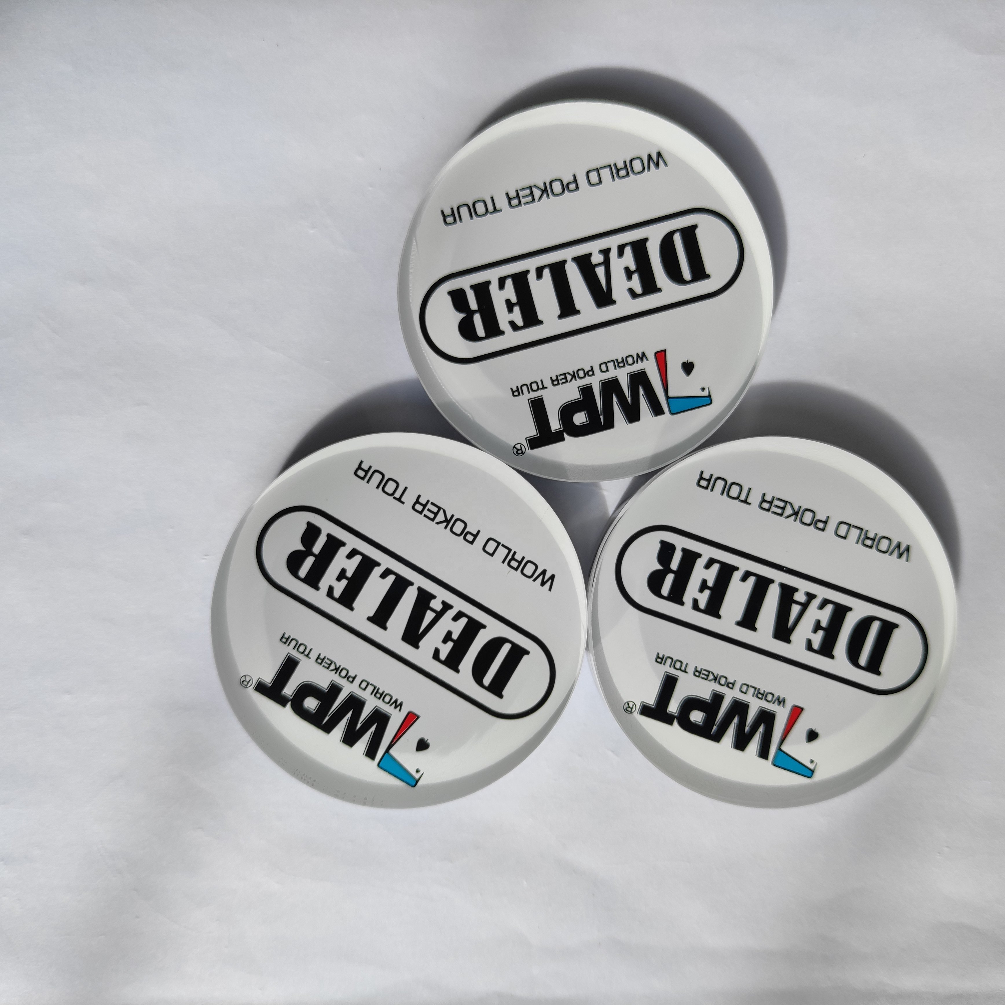 Custom made your dealer button for WORLD POKER TOUR