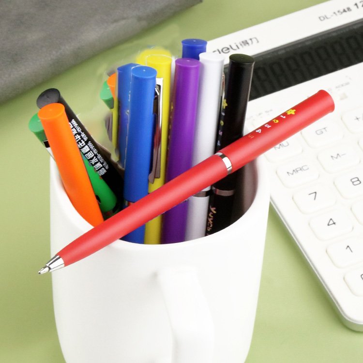 Promotional metal ballpoint pens with custom logos, available in various colors