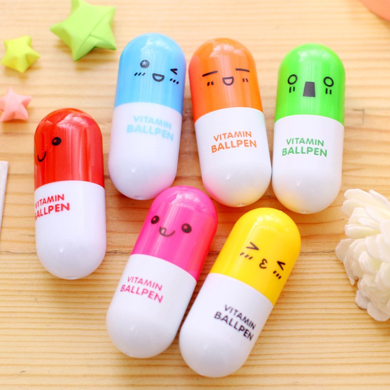 New creative pill ballpoint pen telescopic cute cartoon pen student stationery stationery smiley face emoji pen