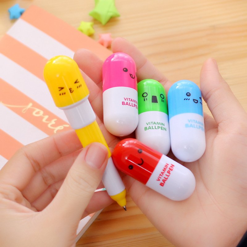 New creative pill ballpoint pen telescopic cute cartoon pen student stationery stationery smiley face emoji pen
