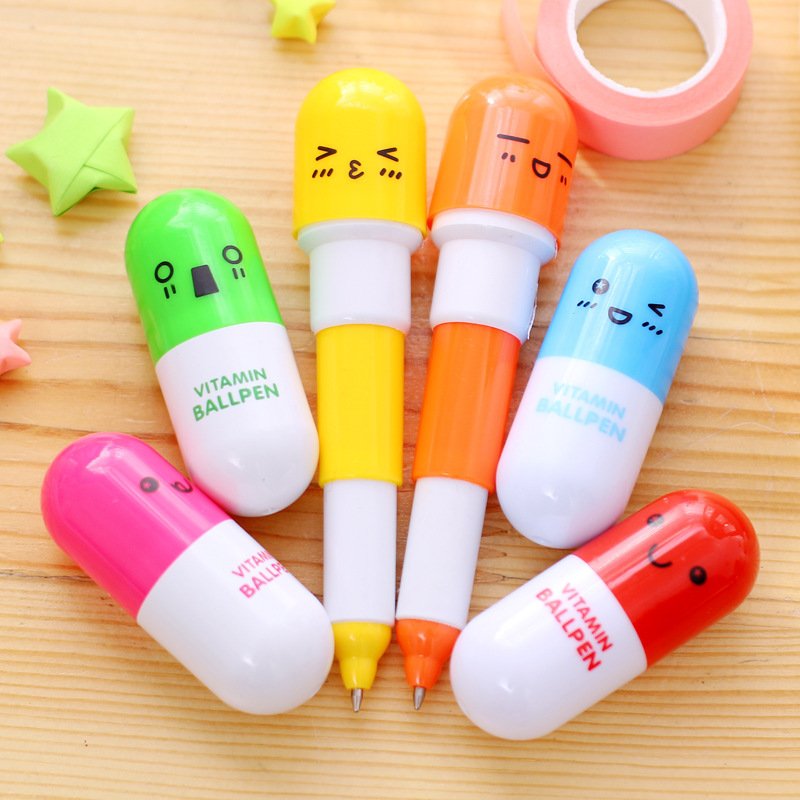 New creative pill ballpoint pen telescopic cute cartoon pen student stationery stationery smiley face emoji pen