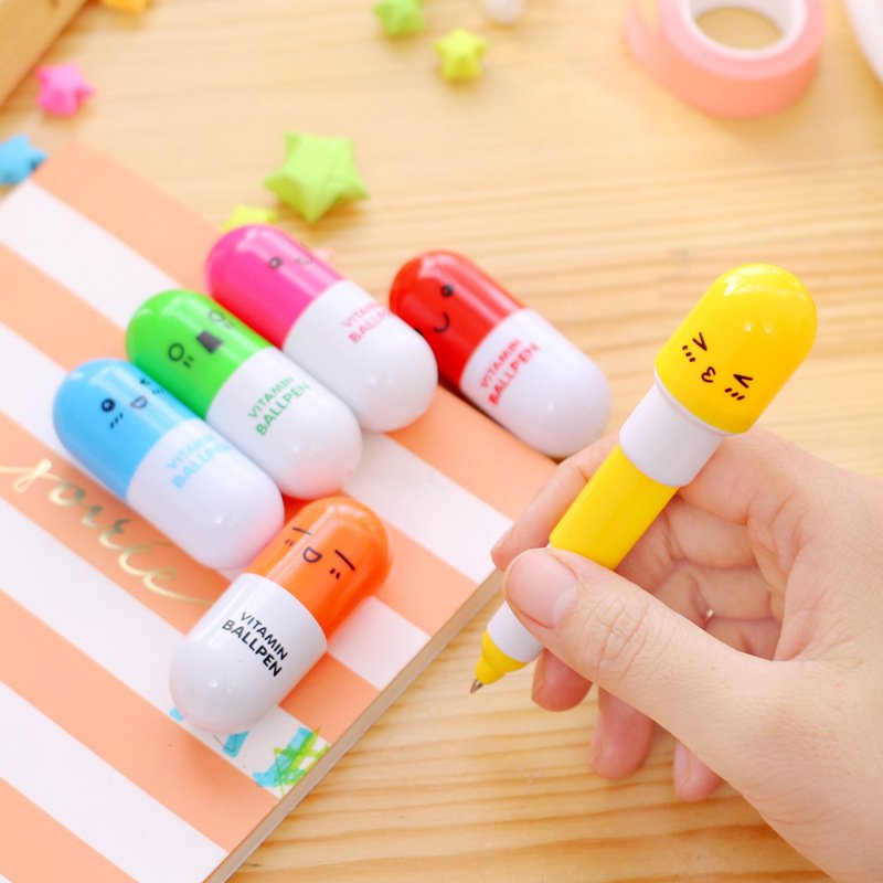New creative pill ballpoint pen telescopic cute cartoon pen student stationery stationery smiley face emoji pen