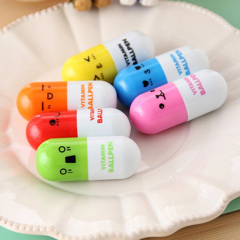 New creative pill ballpoint pen telescopic cute cartoon pen student stationery stationery smiley face emoji pen