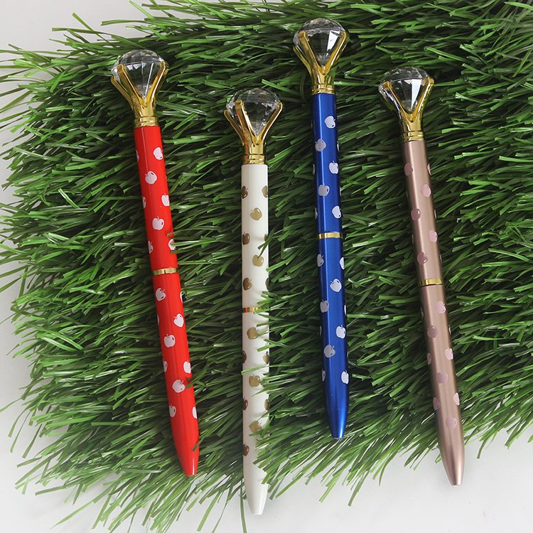 Wholesale prints pattern with apple on the holder ball pens shining crystal ballpoint pen hot sales promotion.
