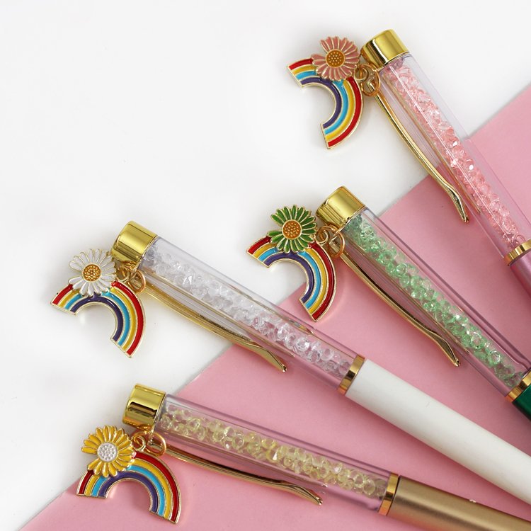 O&Q Wholesale creative rainbow and flower metal pendant twist ballpoint pen with diamond crystal sand Can be customized