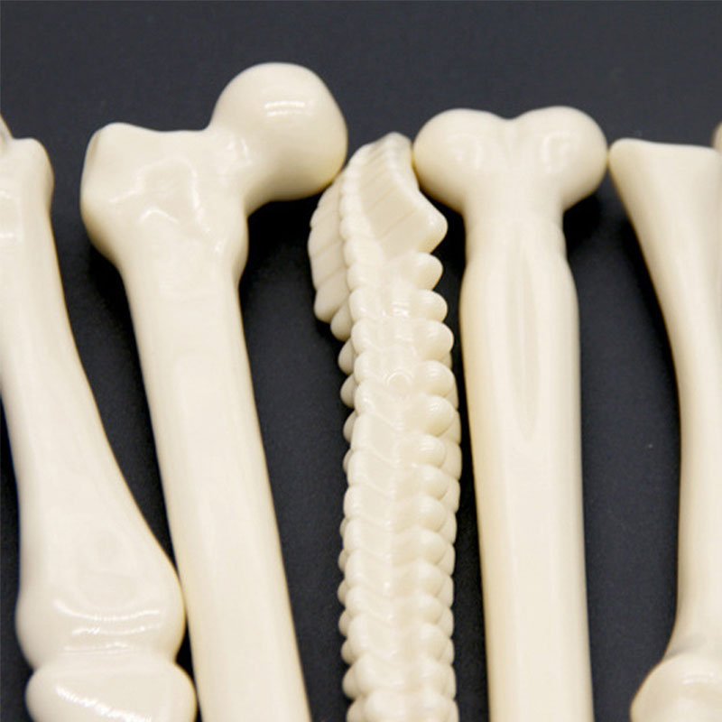 Novelty medical promotional gift plastic bone shaped ballpoint pen with custom logo