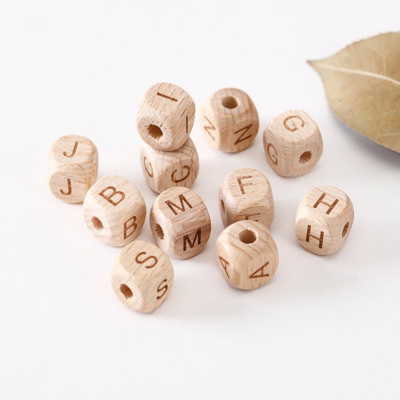 Wholesale Custom 20mm 50mm 100mm laser carved dice wood color Beech square and cube wood English letter with holes wooden toys