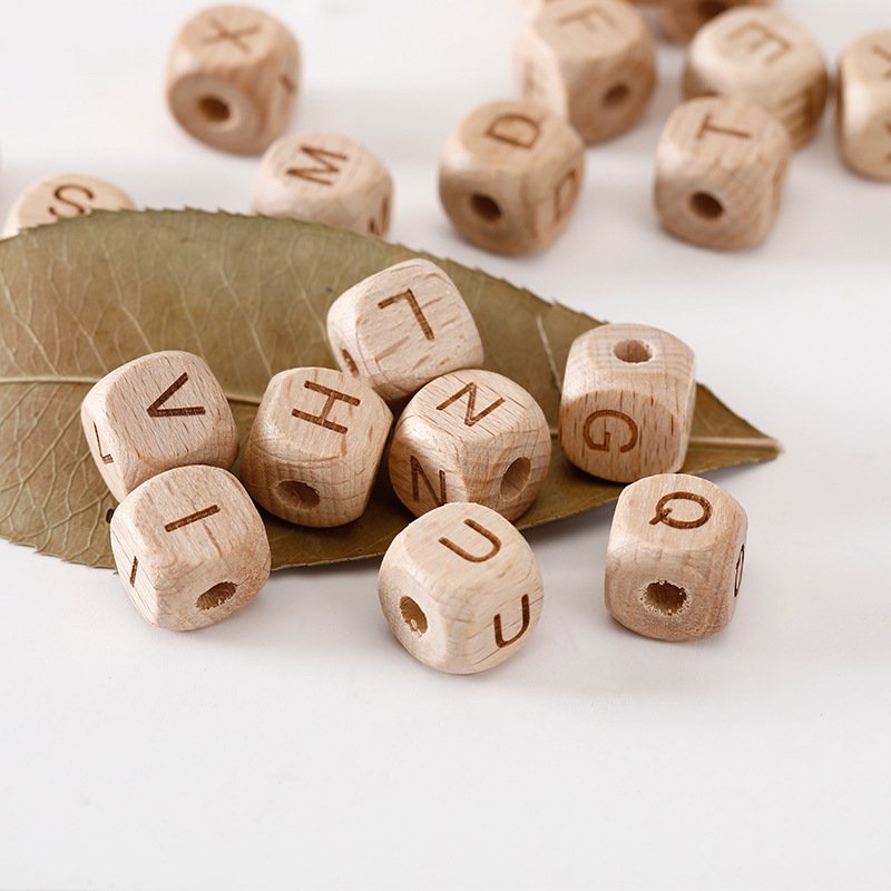 Wholesale Custom 20mm 50mm 100mm laser carved dice wood color Beech square and cube wood English letter with holes wooden toys