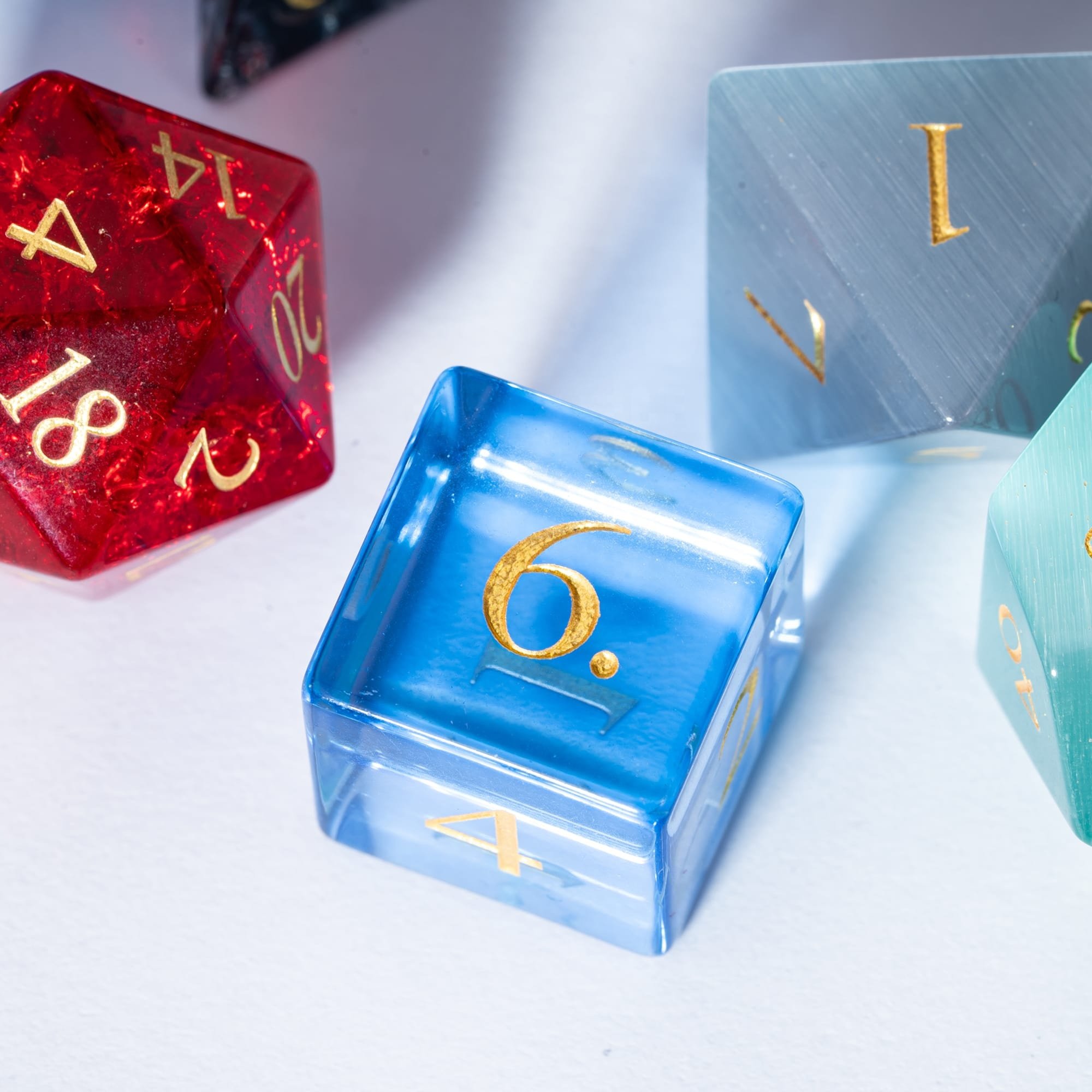 Udixi Polyhedral d&d custom logo dungeons and dragons stone gemstone random glass cube dice game set