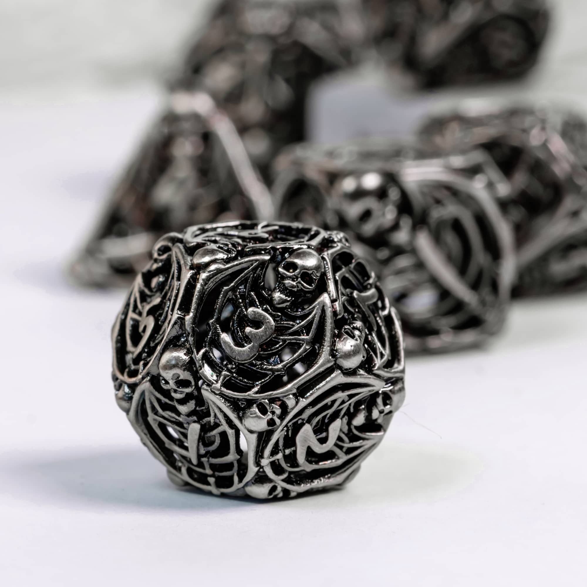 Udixi Polyhedral custom logo rpg dungeons and dragons Hollow Metal dice game set Human bone
