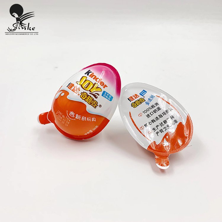 Customized food cartoon chocolate funny egg plastic blister pvc film roll thermoforming blister sheet film