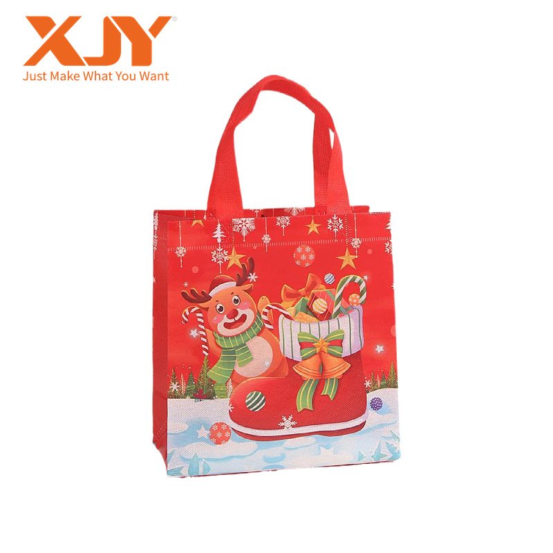 XJY Christmas Theme Children's Candy Handheld Gift Bags Cartoon Waterproof Nonwoven Paper UV Advantage Foil Embossed