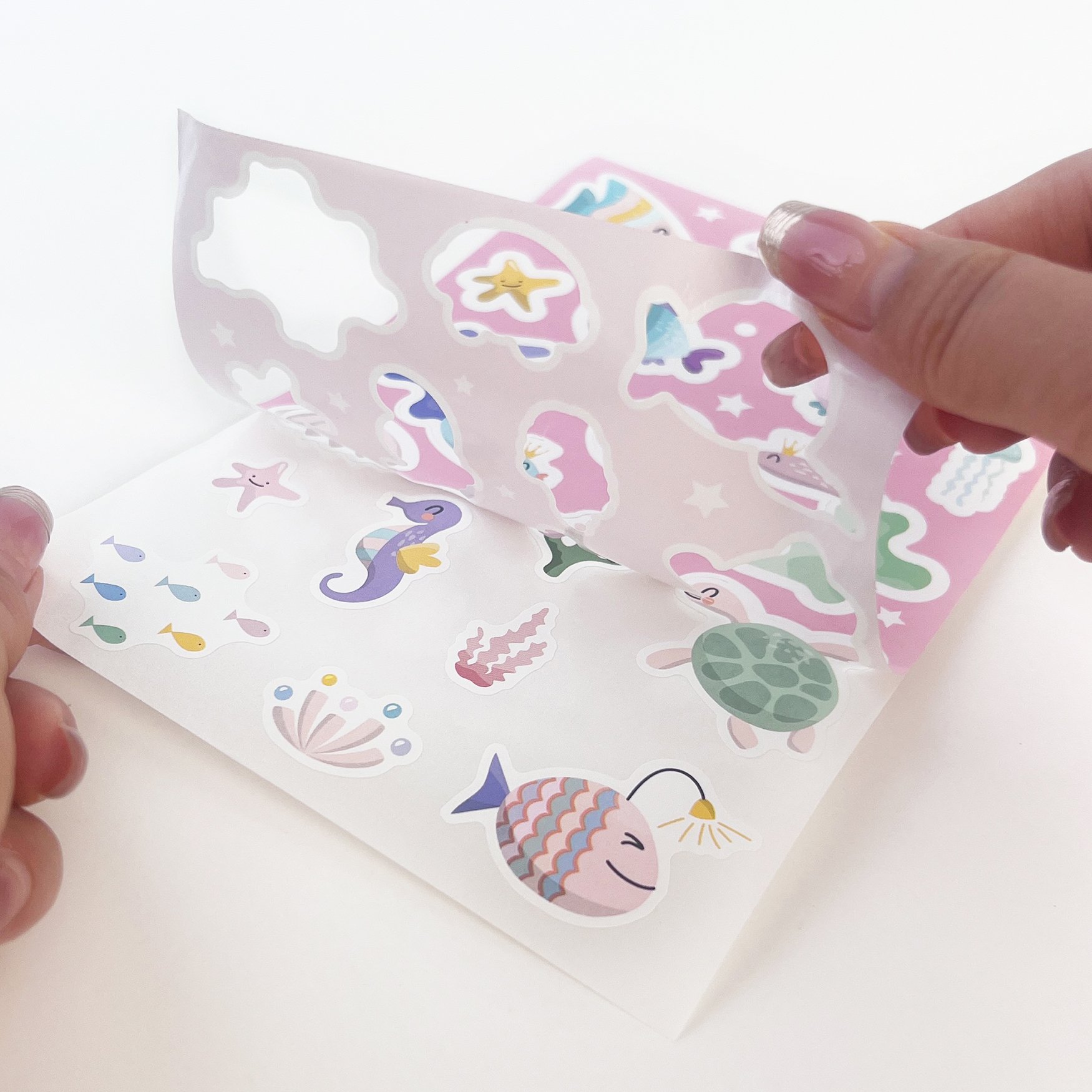 Custom Eco-friendly Adhesive Waterproof Holographic Brand Logo Die Cut Vinyl Paper Cute Kiss Cut Cartoon Sticker Sheet Custom