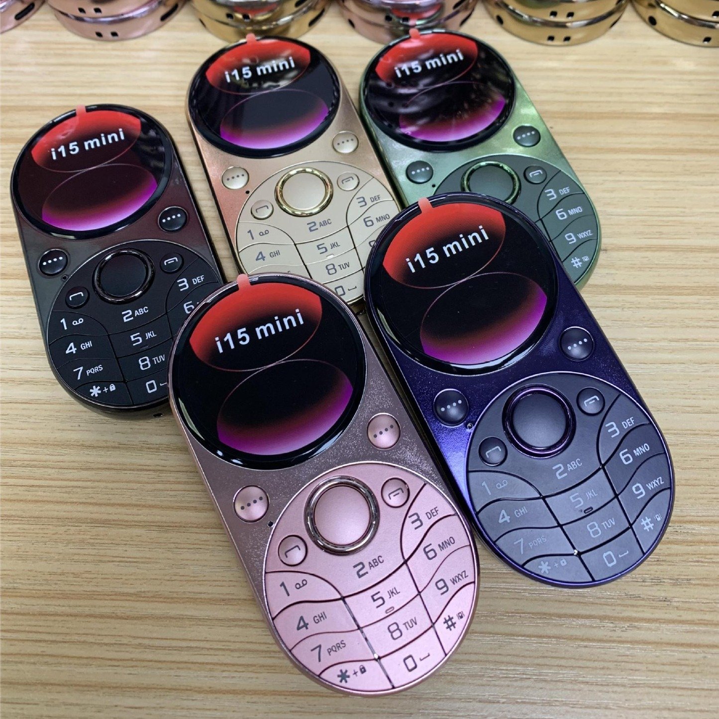 Low price special design round screen dual sim keypad button i15mini bar feature phone