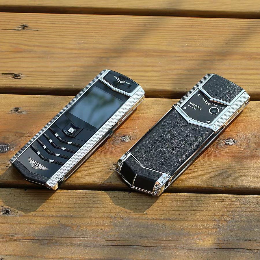 2023 Hot selling unlocked luxury gold Mini phone dialer keypad cell phone elderly mobile phone with Leather case in stock