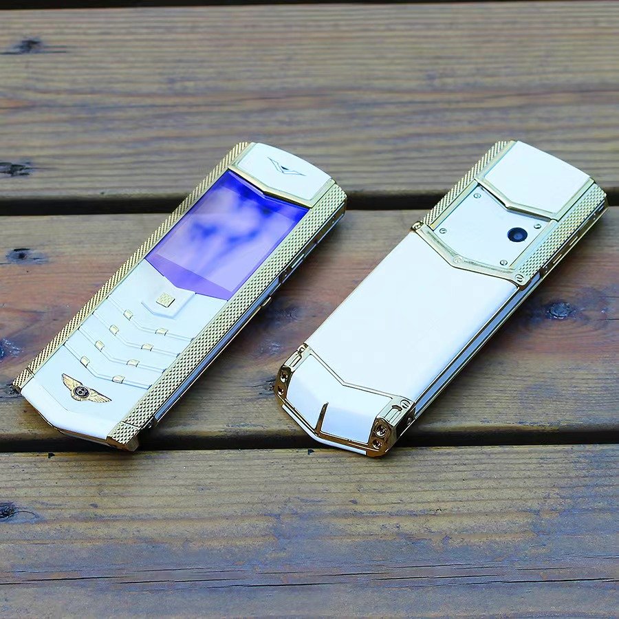 2023 Hot selling unlocked luxury gold Mini phone dialer keypad cell phone elderly mobile phone with Leather case in stock