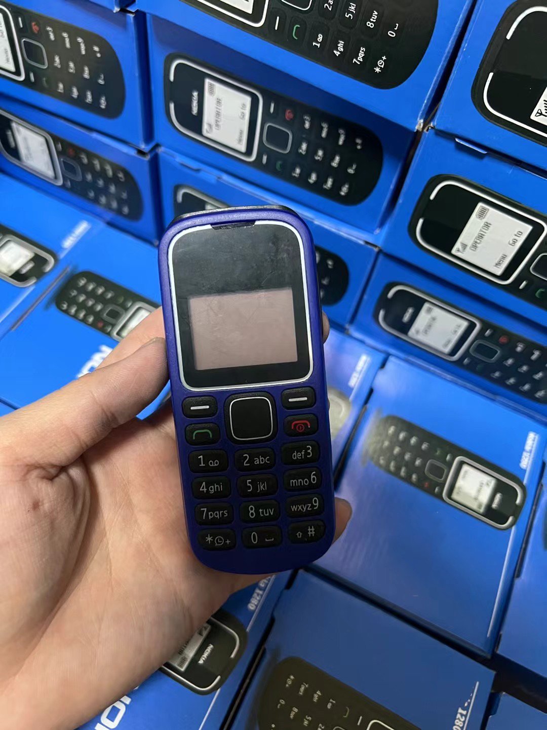 Cross-border mobile phone 1280 GSM 2G elderly phone bar button standby elderly non-intelligent foreign trade mobile phone