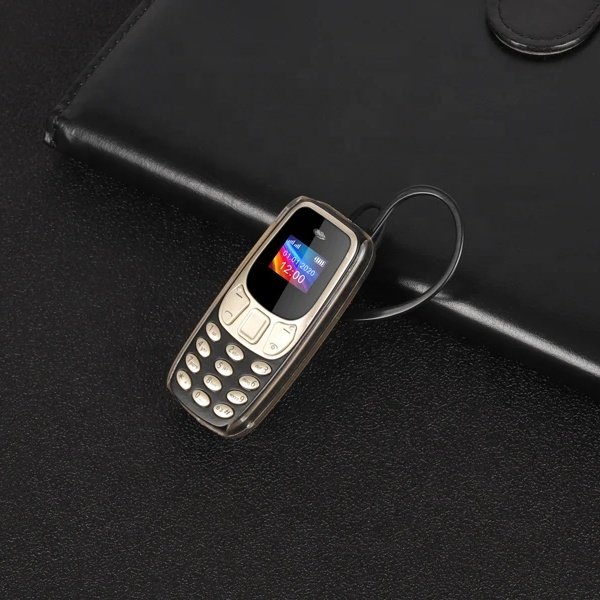 Star BM10 Mini Earphone Phone 0.66'' Tiny Dual SIM Keypad Mobile Earhook Case Included