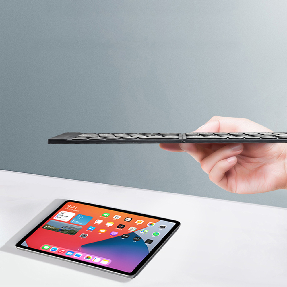Foldable bluetooth mini keyboard with stand and packaging ultra-thin folding bluetooth keyboard