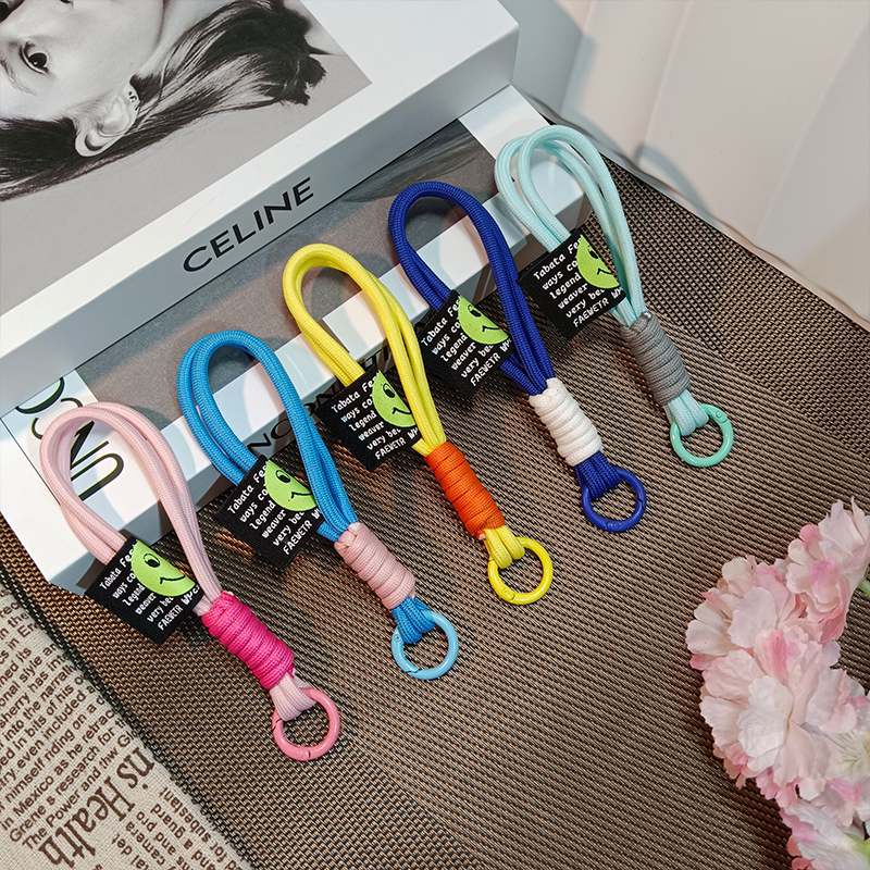 Wrist strap outdoor backpack rope keychain nylon woven rope couple's bracelet handbag smiling face pendant phone accessories