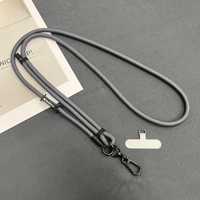 Hands-free mobile phone strap: adjustable metal keychain lanyard with nylon crossbody tether patch.