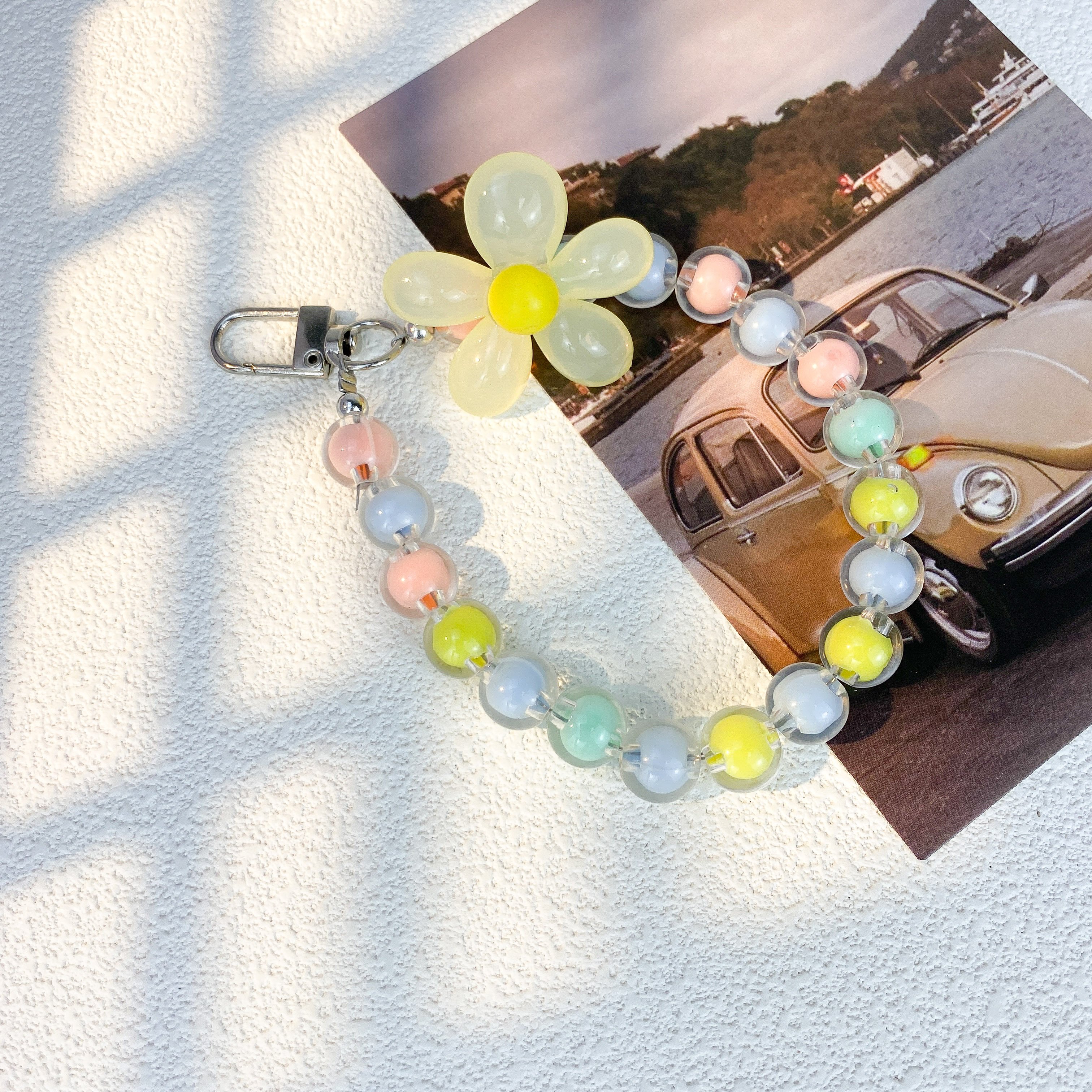 Wholesale Fashion Cute Multi-Color Macaron Beaded Phone Chain Anti-Loss Hand Wrist Lanyard with Flower Charms for Women Keychain