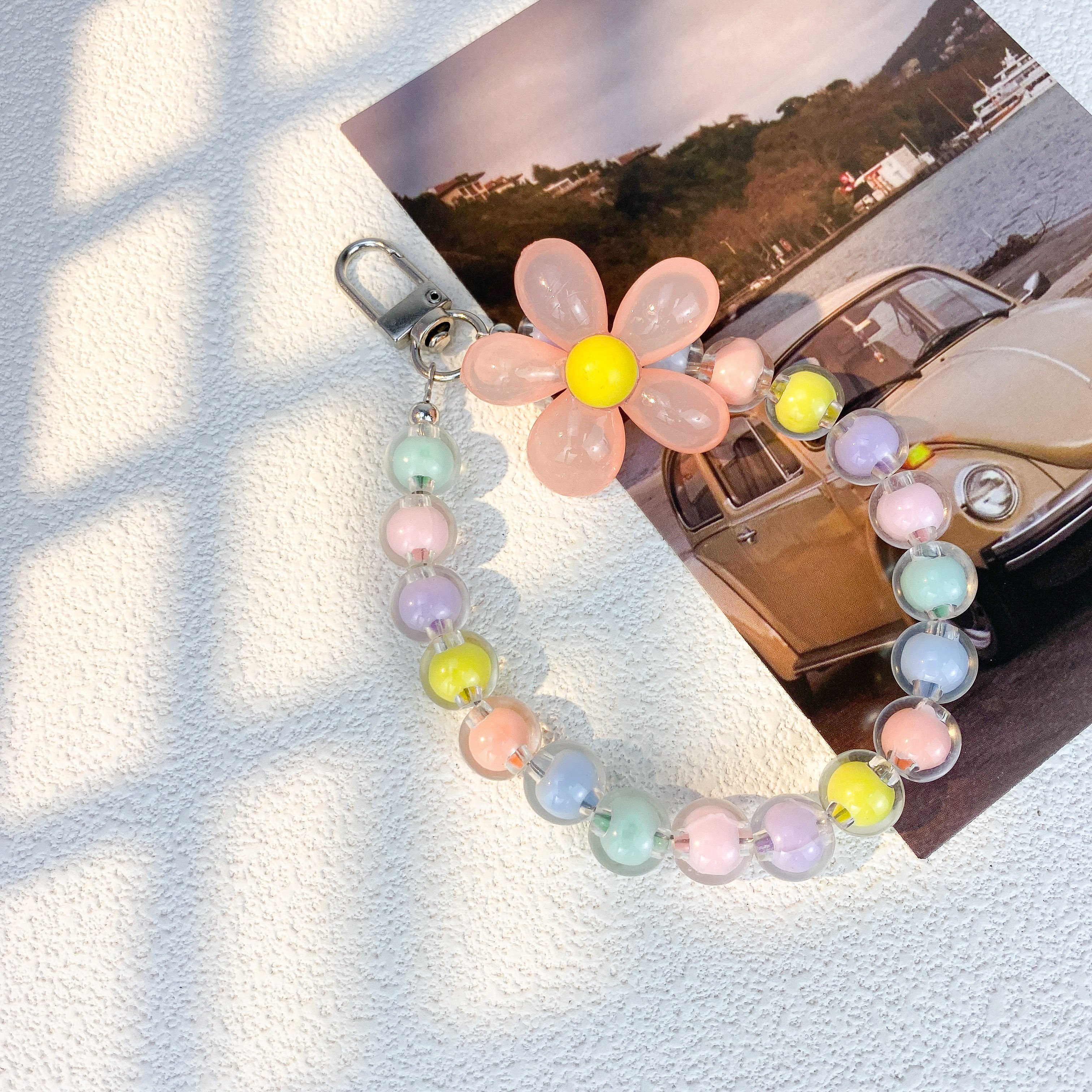 Wholesale Fashion Cute Multi-Color Macaron Beaded Phone Chain Anti-Loss Hand Wrist Lanyard with Flower Charms for Women Keychain