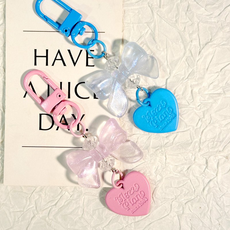 New glow-in-the-dark bow small pendant Mobile phone chain Headphone bag accessories mobile phone chain