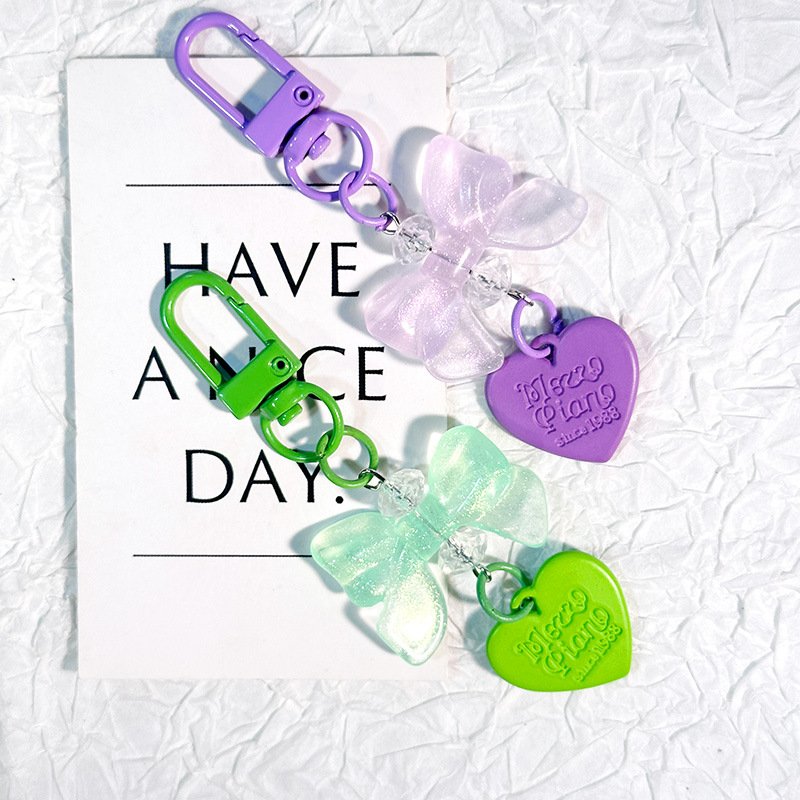 New glow-in-the-dark bow small pendant Mobile phone chain Headphone bag accessories mobile phone chain
