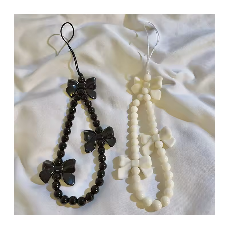 2024 Japan and Korea best-selling Charm bow mobile phone chain Girl phone Charm with pearl beaded lanyard jewelry gift