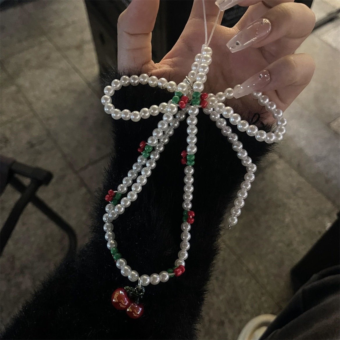 Korean niche cherry ins style fashion cute bow beaded mobile phone lanyard bag pendant transparent pearl