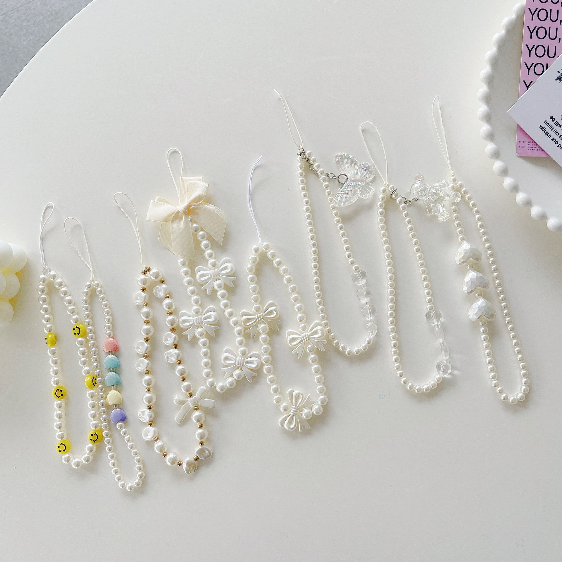 New model suitable for pearl bow mobile phone lanyard, crystal teddy bear, girl's heart Love pendant beaded mobile phone chain