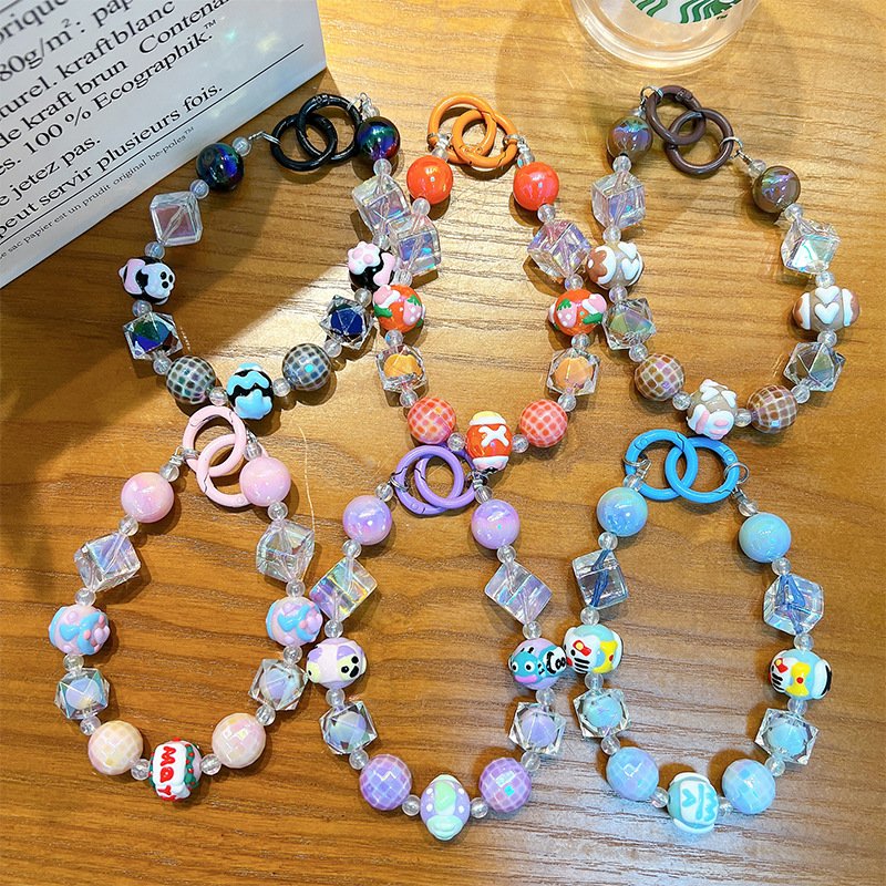 Cute cartoon beaded mobile phone chain key chain acrylic hand-painted beaded wrist strap bag headphone pendant wholesale