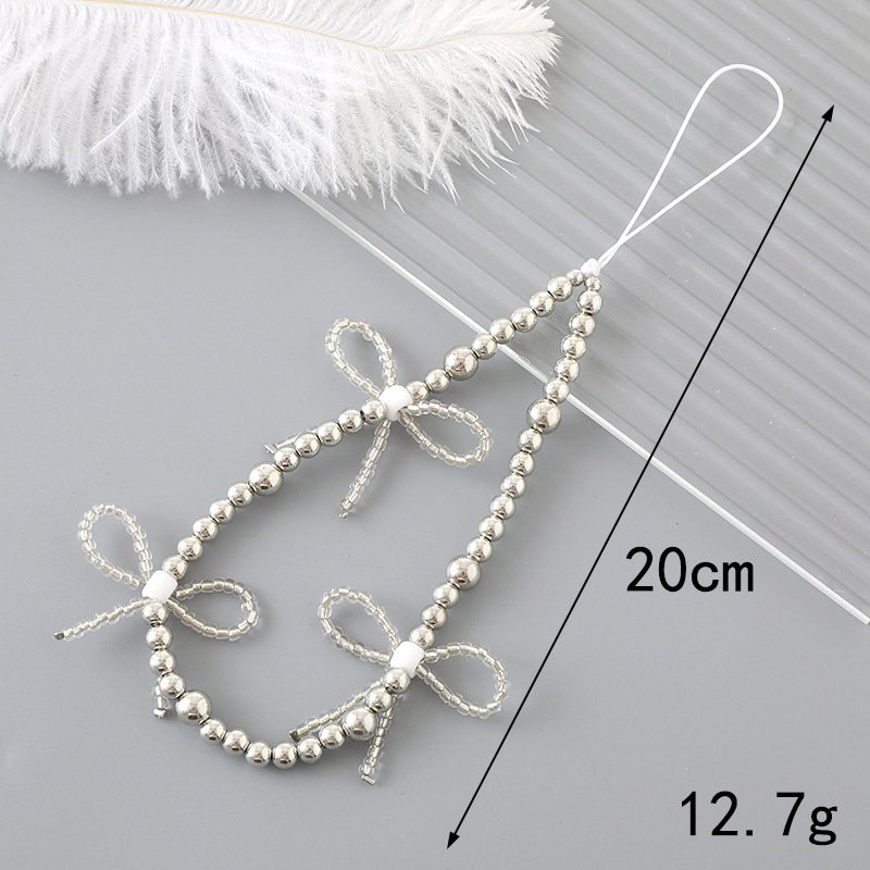 Beaded phone bracelet strap with cute butterfly, bowknot, and star charms; perfect for phone keychains and bag pendants