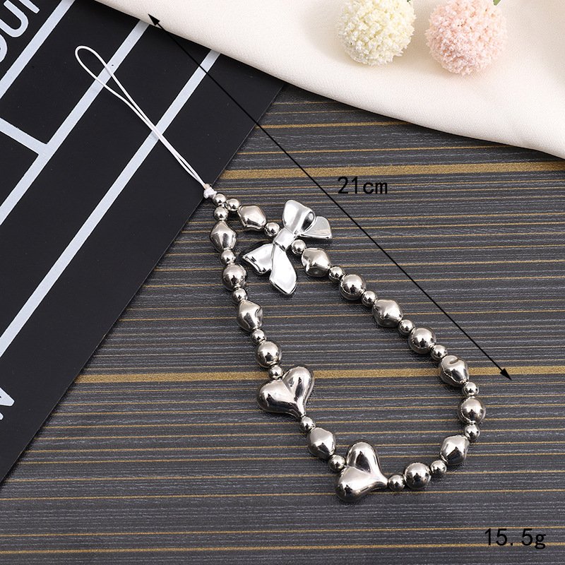 Beaded phone bracelet strap with cute butterfly, bowknot, and star charms; perfect for phone keychains and bag pendants