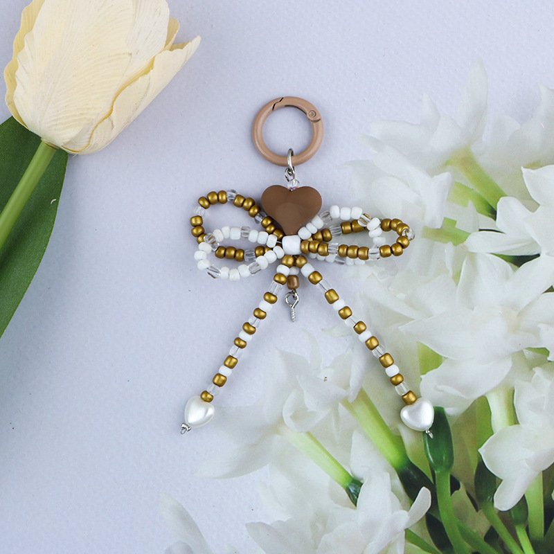 Factory wholesale acrylic keychain cute bow keychain beading mobile phone case charm accessories